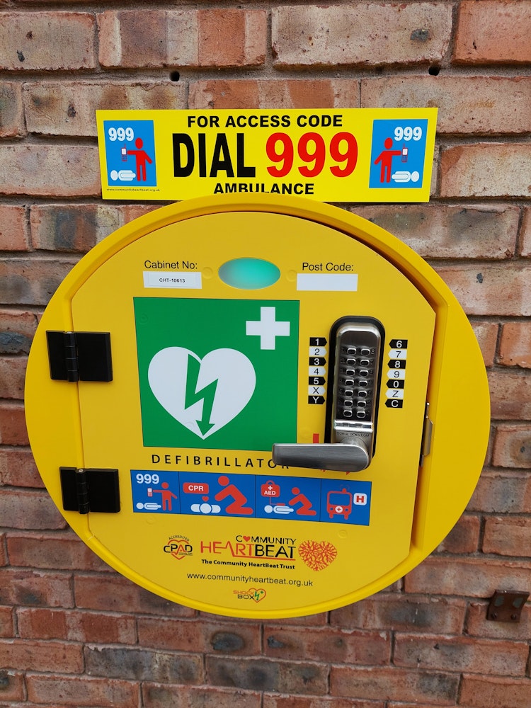 Defibrillator machine mounted on a wall
